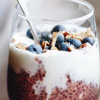 Chia Overnight Oats in a cup with a spoon.