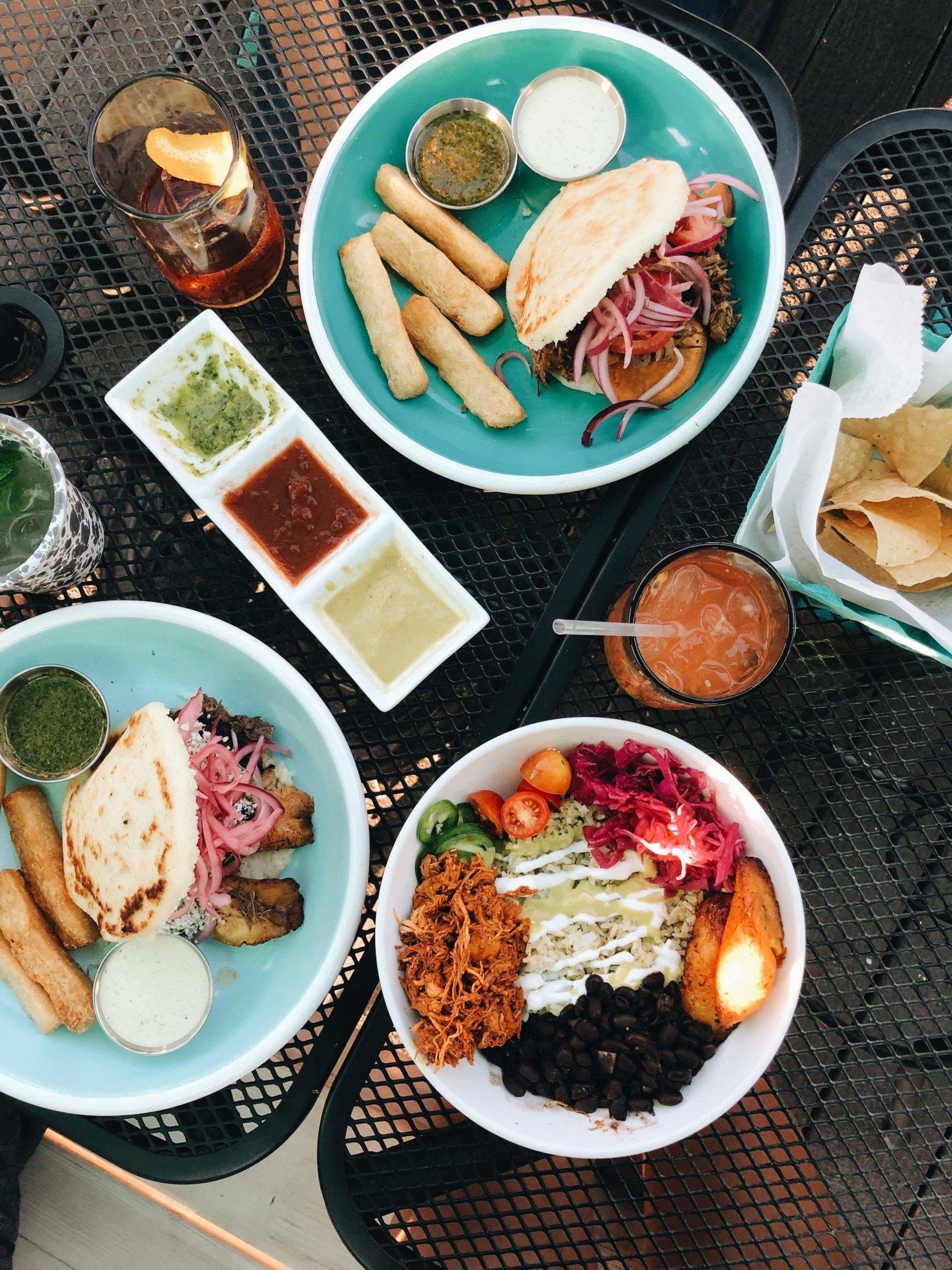 Several dishes on a restaurant table.