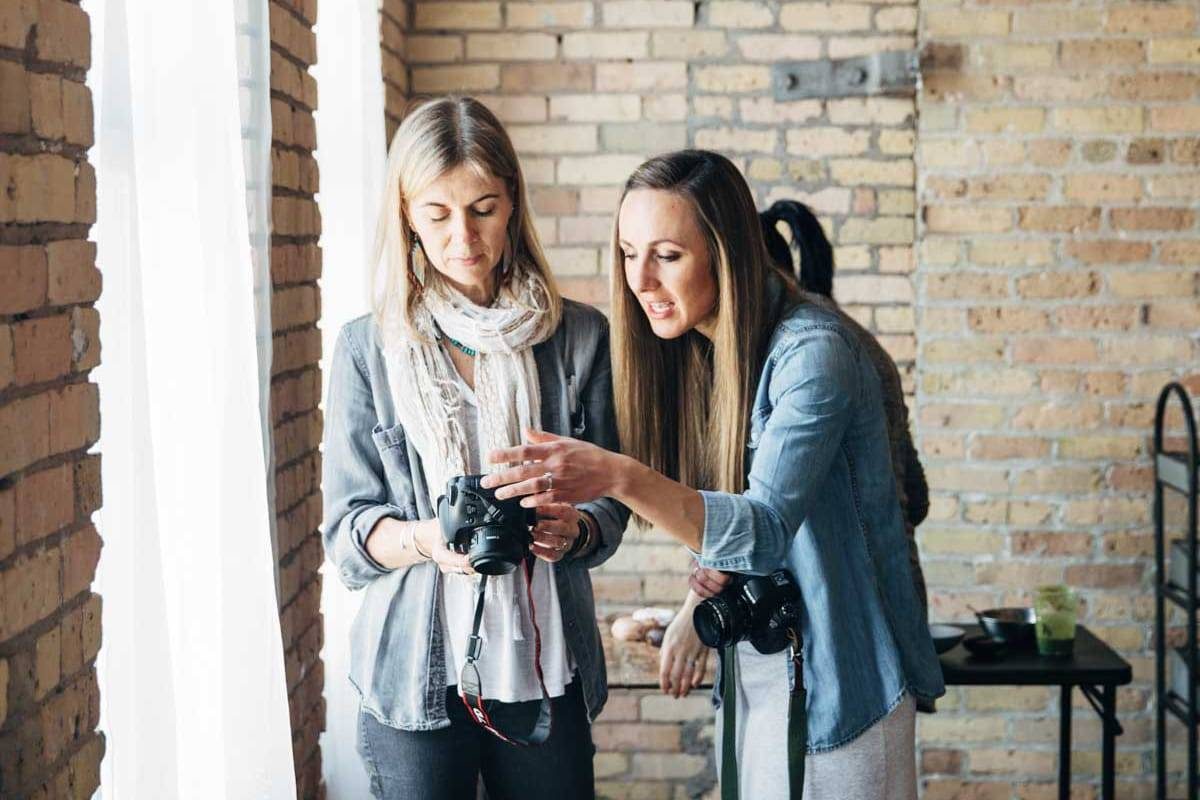 Women working with cameras.